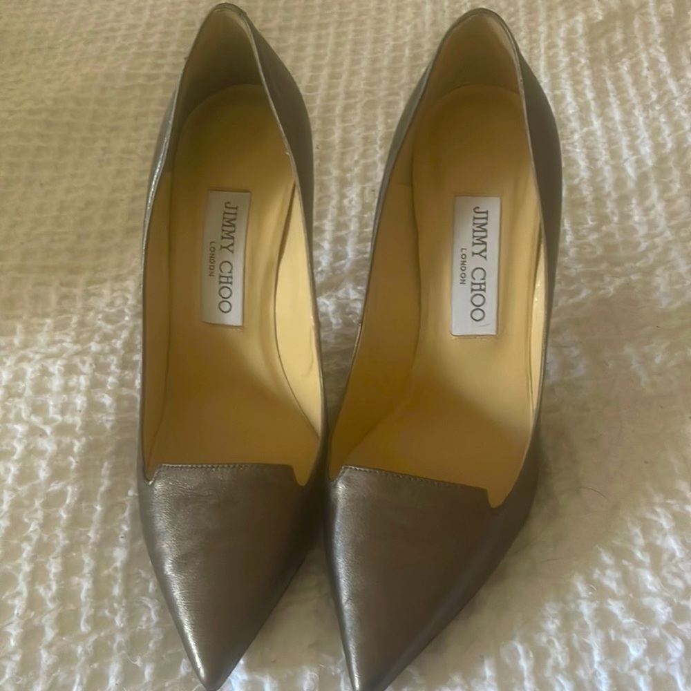Beautiful Jimmy Choo heels. Wore only in the house. Never work outside.